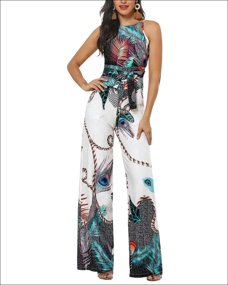 A vibrant peacock feather print jumpsuit with high neckline, wide-leg pants, and matching belt tied at the waist