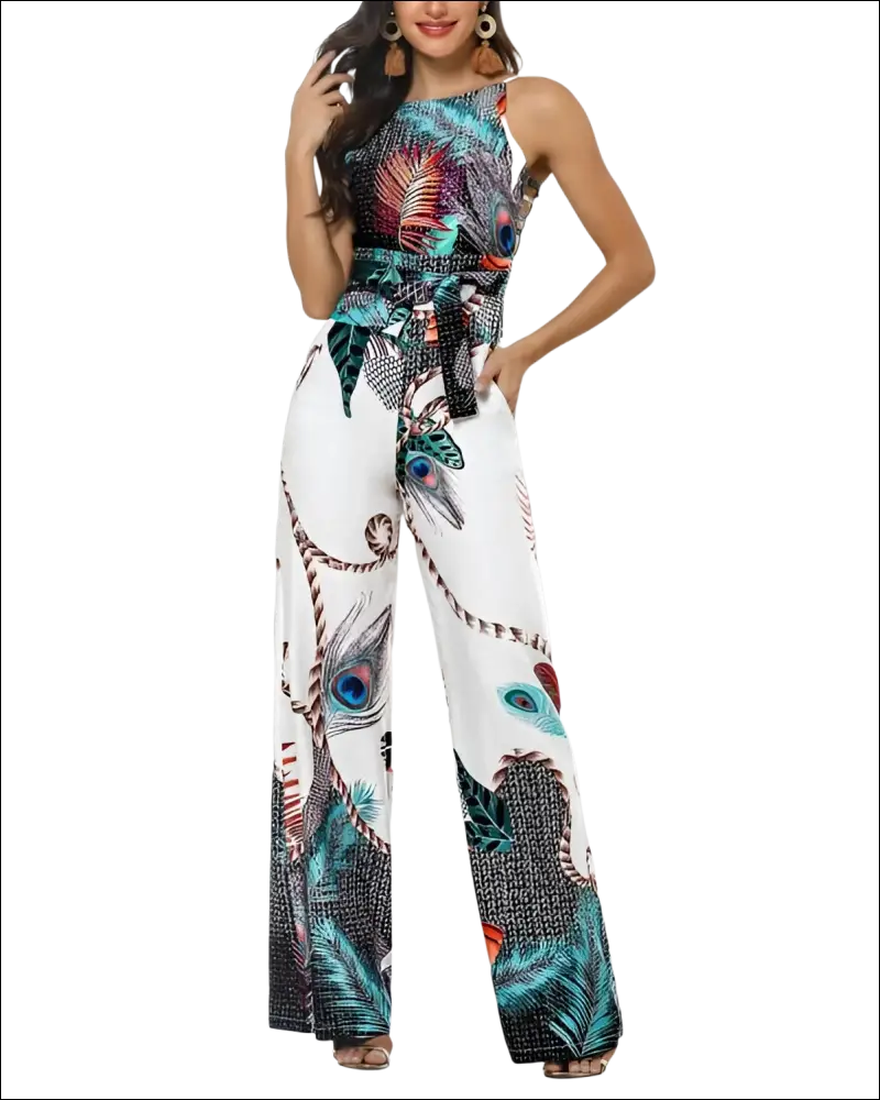 White sleeveless jumpsuit featuring a vibrant teal black and orange peacock feather print for stylish wear