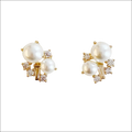 Gold-toned stud earrings with pearl and cubic zirconia cluster for luxury women’s fashion accessories
