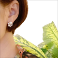 Pearl and cubic zirconia cluster stud earrings with white pearls and clear crystal accents for luxury women’s fashion