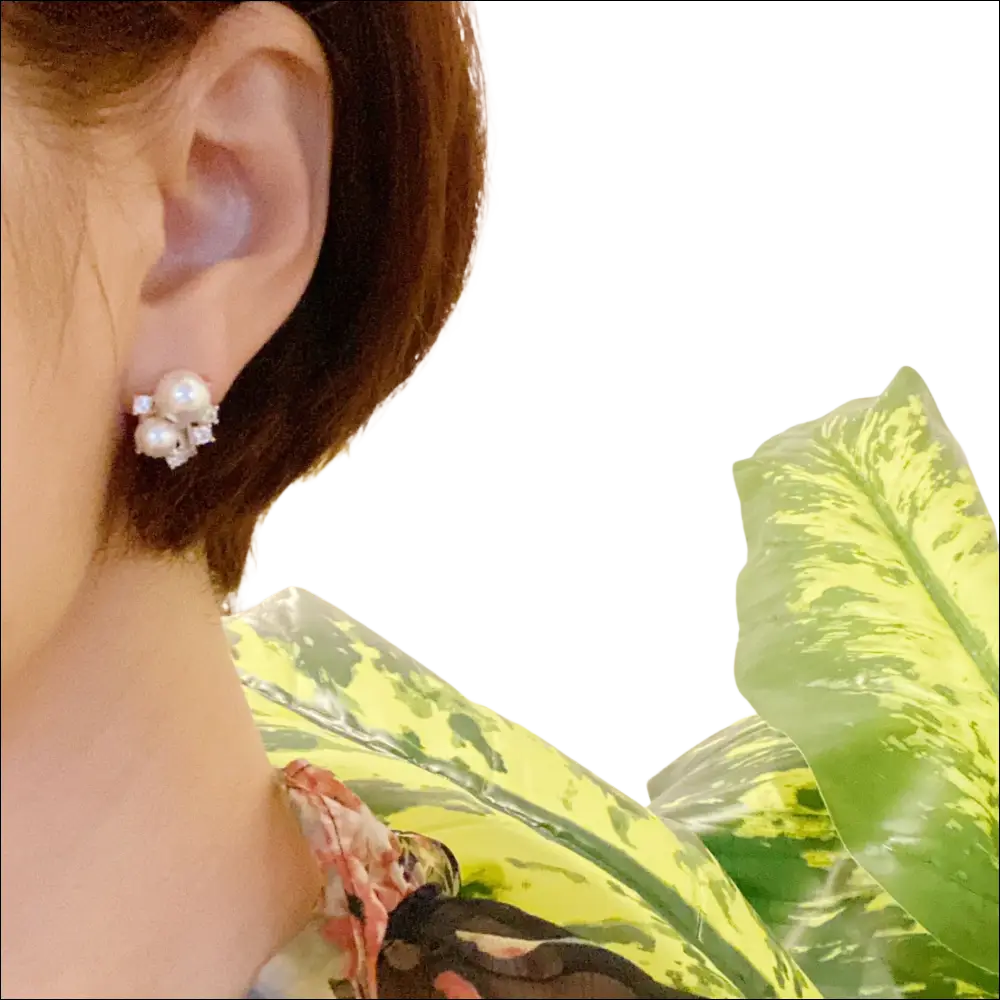 Pearl and cubic zirconia cluster stud earrings with white pearls and clear crystal accents for luxury women’s fashion