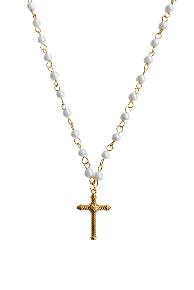A delicate gold-toned cross pendant necklace with white pearls and gold links for luxury women’s fashion