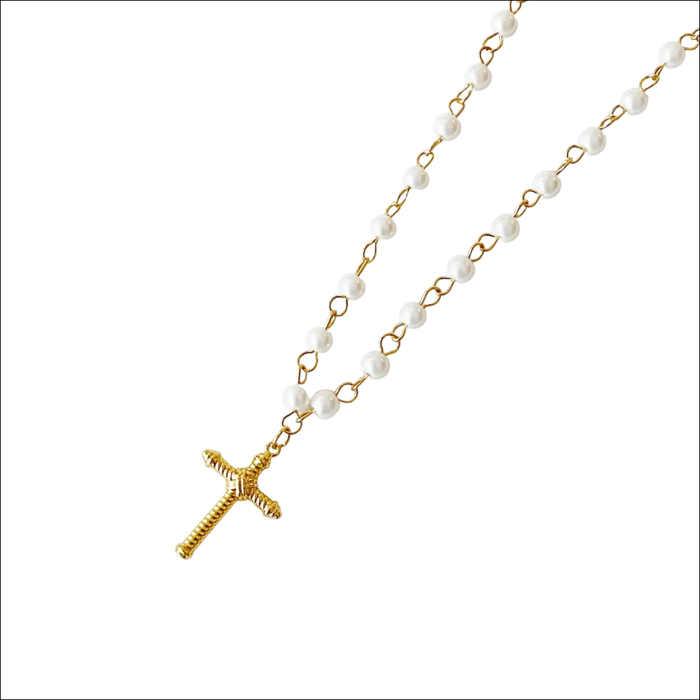 Gold-toned cross pendant necklace with textured pendant and white pearls for luxury women’s fashion accessory