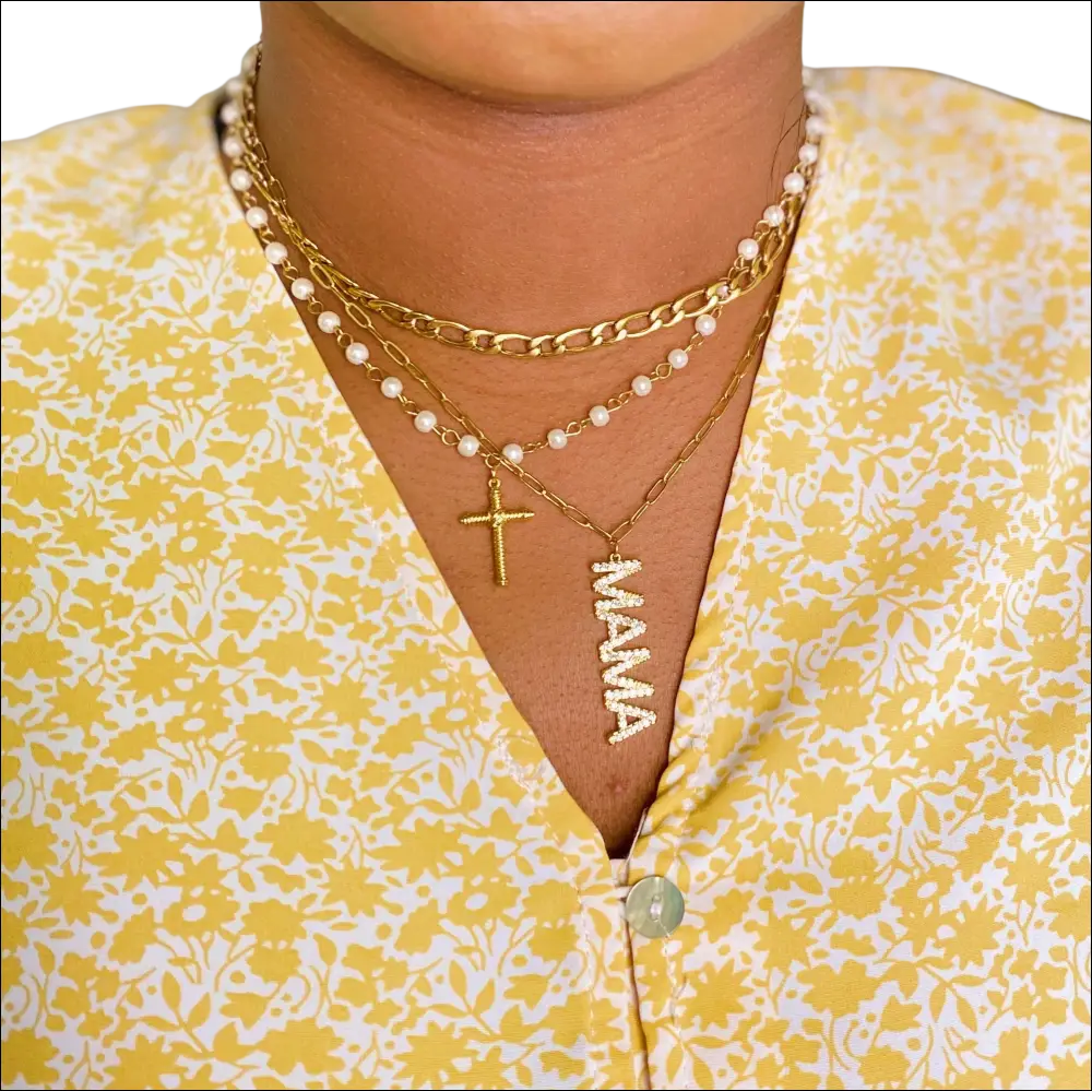 Gold-toned layered necklaces with pearls and cross pendant featuring a mama charm for luxury women’s fashion