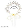 Elegant pearl handmade headband featuring gold-toned alloy flower crystal and delicate pink crystals with yellow ribbon bow