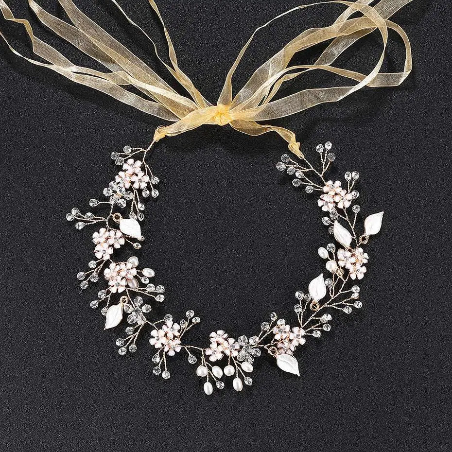 Delicate pearl handmade headband with alloy flower crystal, pink and clear crystals, white pearl leaves, and sheer gold bow