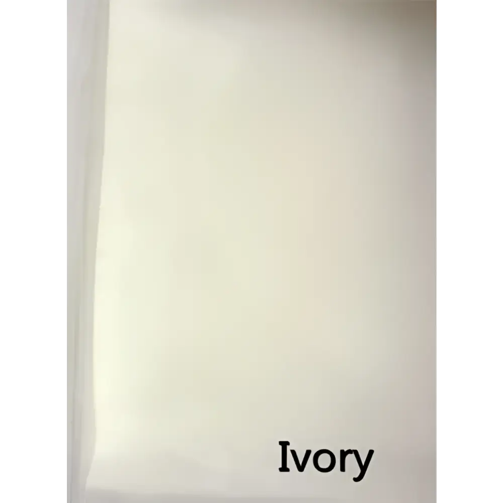 Ivory-colored fabric swatch showcasing the soft textured surface of a luxury wedding veil with delicate white pearl beaded accents