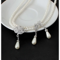 Elegant double-strand pearl lotus pendant alloy necklace set with silver leaf clasps and teardrop pearls for bride wedding