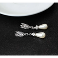 Silver-winged dangle earrings with sparkling rhinestones and white pearls for bride wedding pearl lotus pendant alloy necklace set