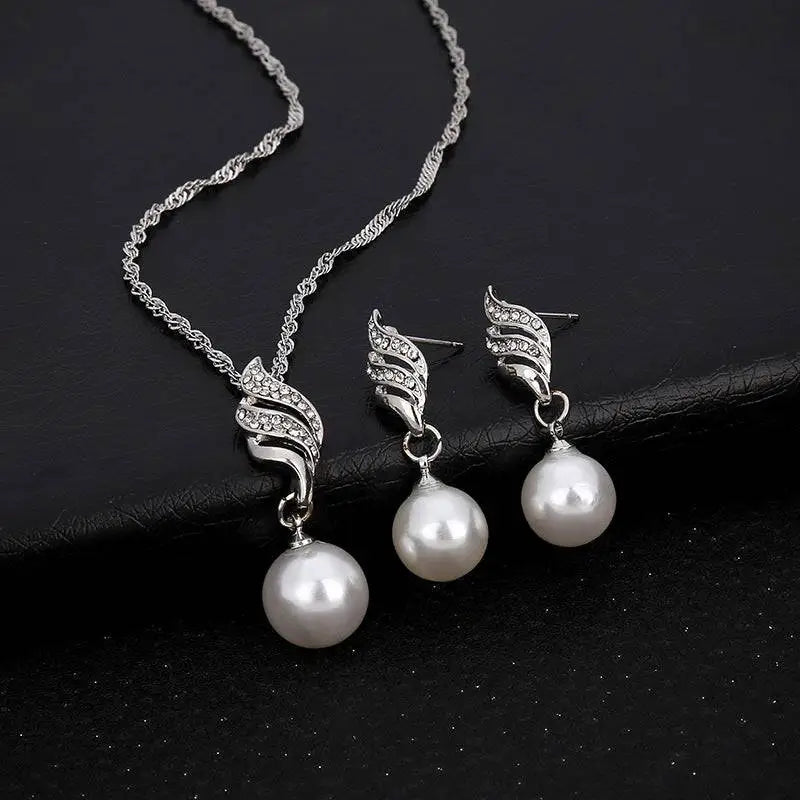 Silver wing-shaped pearl rhinestone necklace set with dangling white pearls and crystal accents united states ebay explosion models accessories
