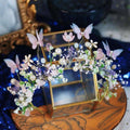 Delicate performance butterfly garland headdress with pastel pink lavender white beads and pearls on gold wire frame