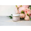A clear jar with white lid contains light beige clay facial mask for gentle exfoliation in personalized Ashley pampering natural skincare mom gift