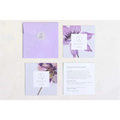 Lavender-colored paper envelope with silver logo sticker for personalized ashley pampering natural skincare mom gift