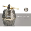 A personalized metal creative oil-electric hybrid lighter with a sleek barrel shape black silver marble finish and gold accents