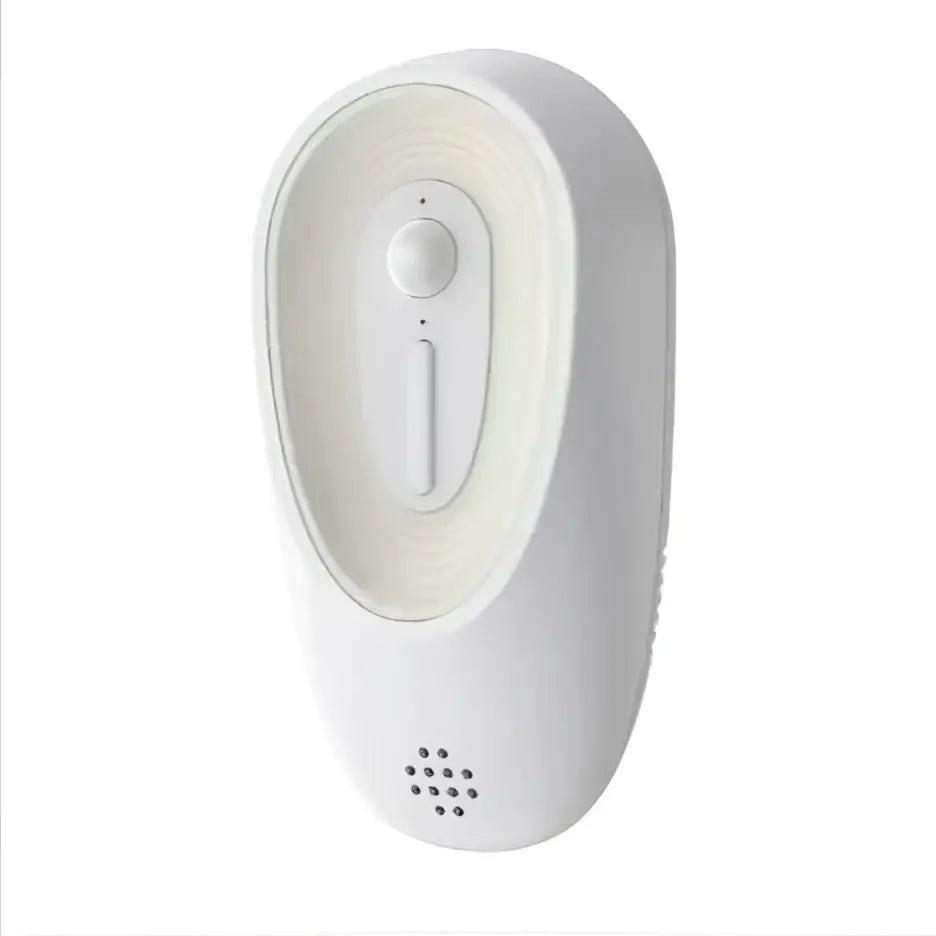 White plastic pet odor eliminator night light with circular button and vertical slider for litter boxes