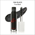 A sleek glass bottle of phoera high shine crystal lip gloss in 106 black true black with bold red hot shine branding