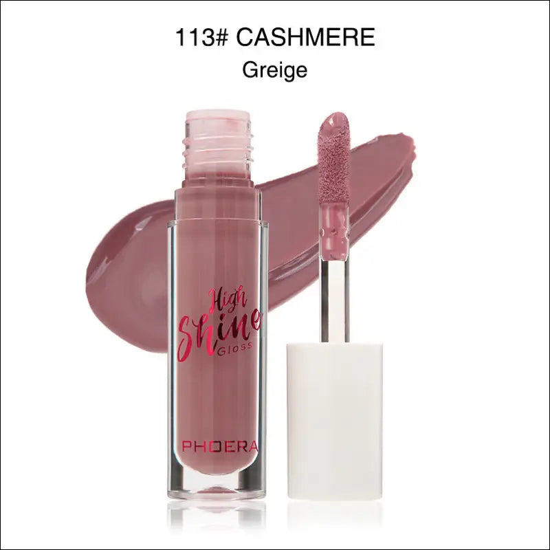A sleek transparent bottle of phoera high shine crystal lip gloss in shade 113 cashmere with white cap and mauve-pink liquid for luxury women’s fashion looks