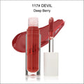 A clear glass tube of phoera high shine crystal lip gloss in deep berry color with silver applicator wand for luxury women’s fashion