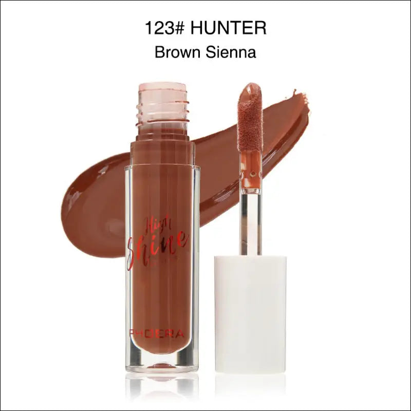 Brown sienna phoera high shine crystal lip gloss in clear glass tube with white cap and silver applicator for luxury women’s fashion
