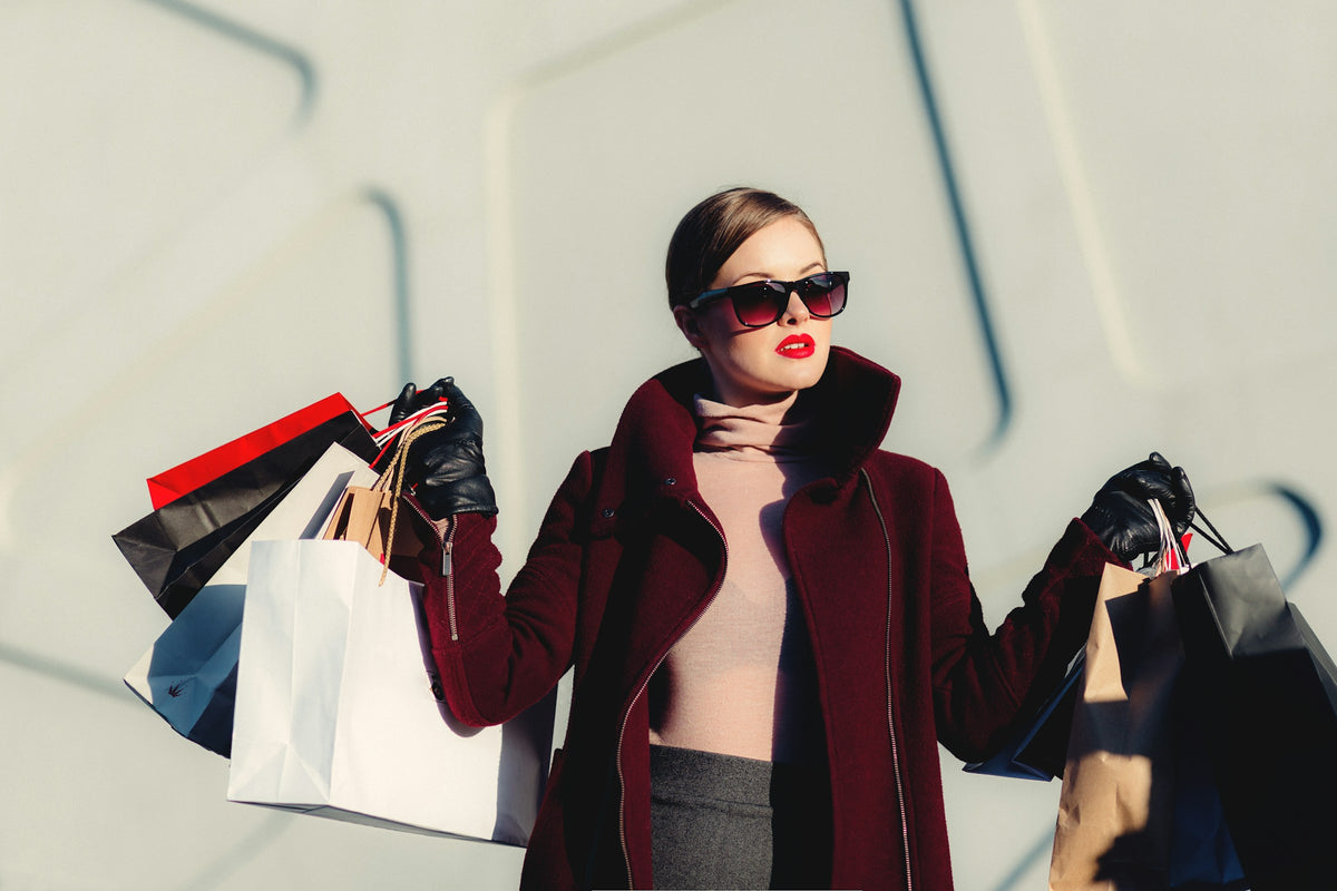Woman shopping with luxury bags