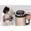 Gold-colored stainless steel electric kettle double insulated with black lid handle and silver metallic rim around top