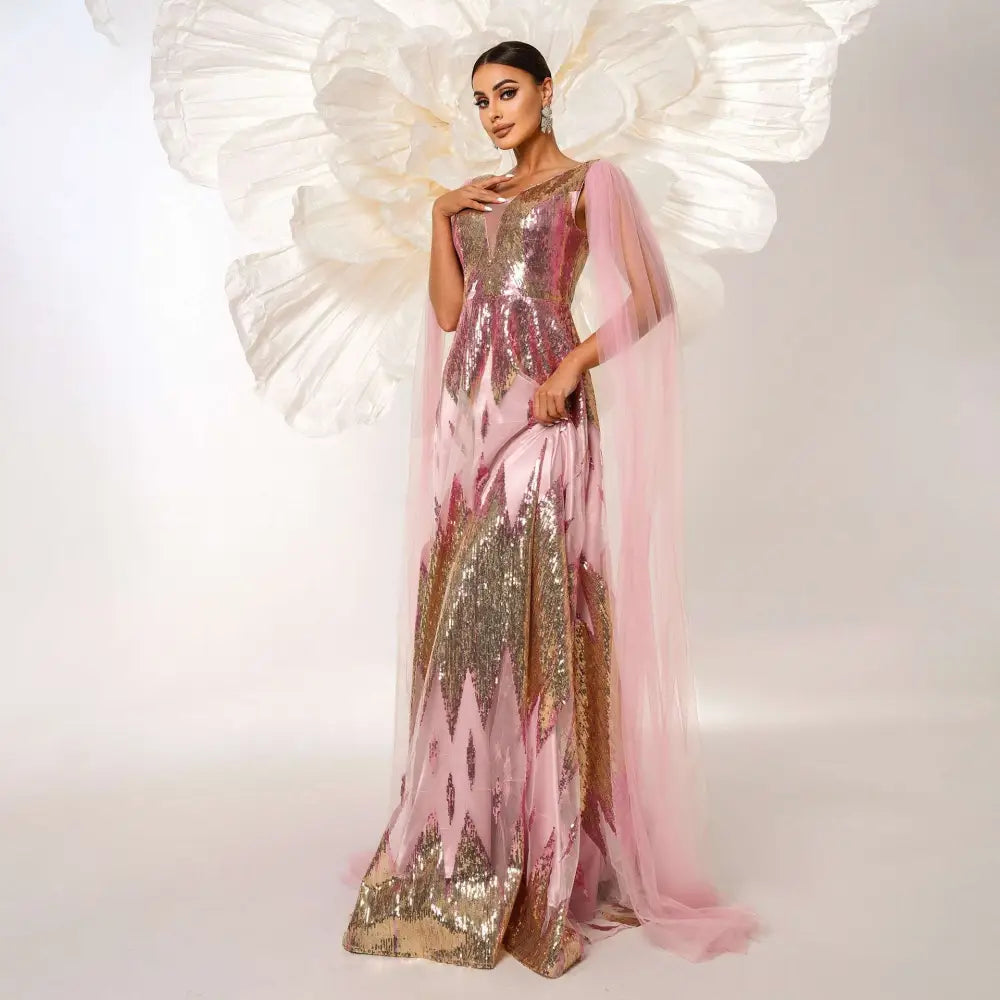 Pink and gold mesh long sleeve sequins large swing dress featuring a flowing gown with a sheer capelet