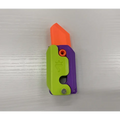 A vibrant gravity cub toy lime radish knife with a bright orange blade and lime green purple handle for printing gravity cub