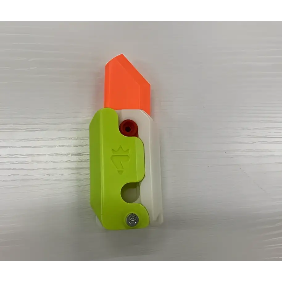 Bright lime green and white plastic lime radish knife with orange blade for gravity cub toy and printing gravity cub use