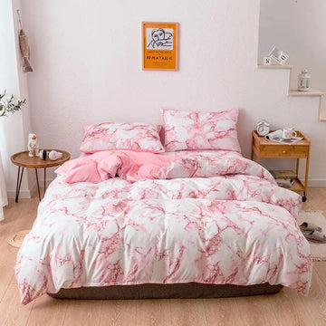 Pink and white marble bed sheets set featuring a marble pattern duvet cover and white marble bed design