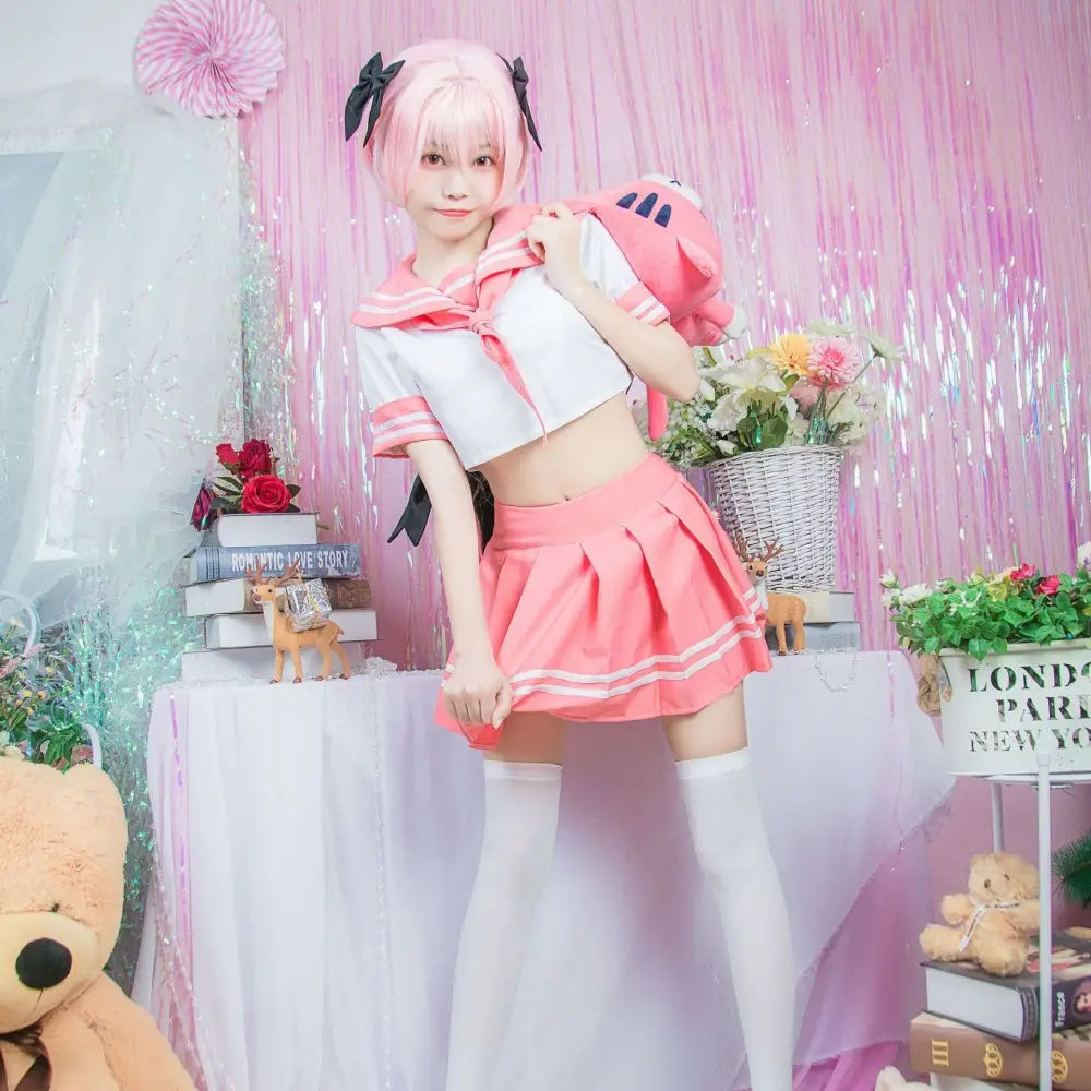 Pink and white sailor suit cosplay costume fgo with black bow accents and pink plush cat accessory visible on the front