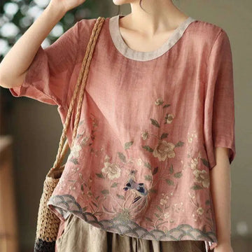 A soft pink art retro embroidery linen top with beige linen round neckline and delicate floral detailing