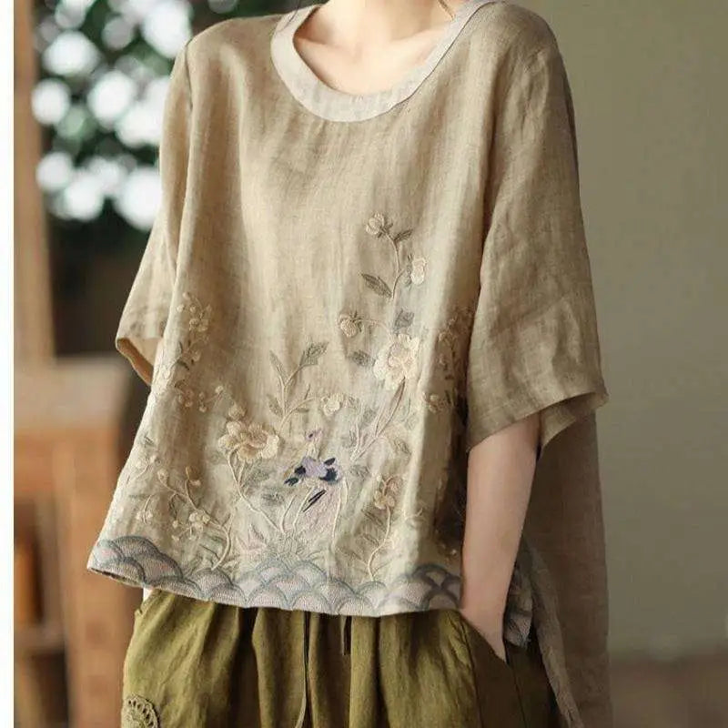 Beige linen round neck top with pink art retro embroidery and delicate floral design featuring scalloped hem