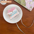 Pastel pink and light blue gingham fabric small jaw clip with secure jaw clip and pink butterfly floral bow decoration