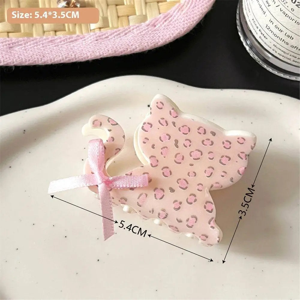 Pink butterfly floral small jaw clip featuring a secure jaw clip design with pink leopard-print cat shape and satin bow