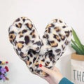 Pink cross strap slippers leopard plush house shoes with fuzzy leopard print and soft plush tan black and brown spots