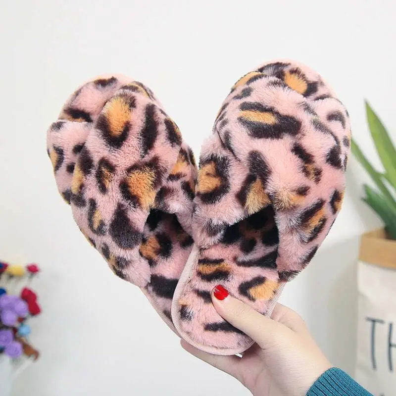 Pink cross strap slippers leopard plush house shoes with fuzzy plush texture and crossed-over design for indoor use