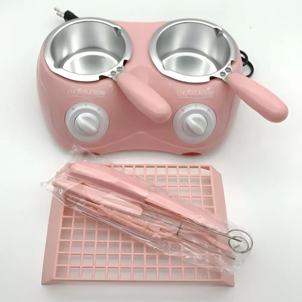 Pink dual chamber chocolate melting pot with stainless steel bowls, pink handles, and white control knobs for melting furnace use