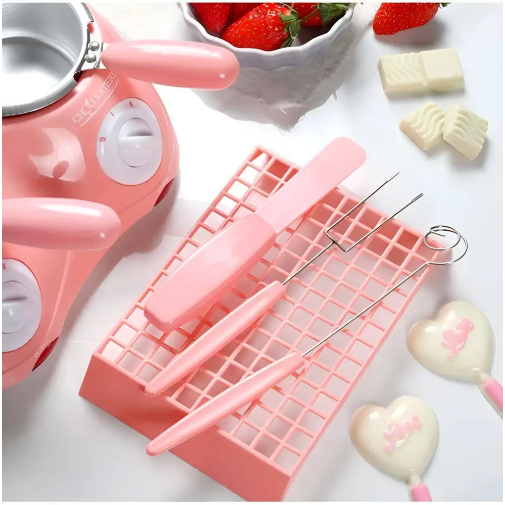 Pink dual chamber chocolate melting pot with rounded handles white control dials ideal for melting furnace use