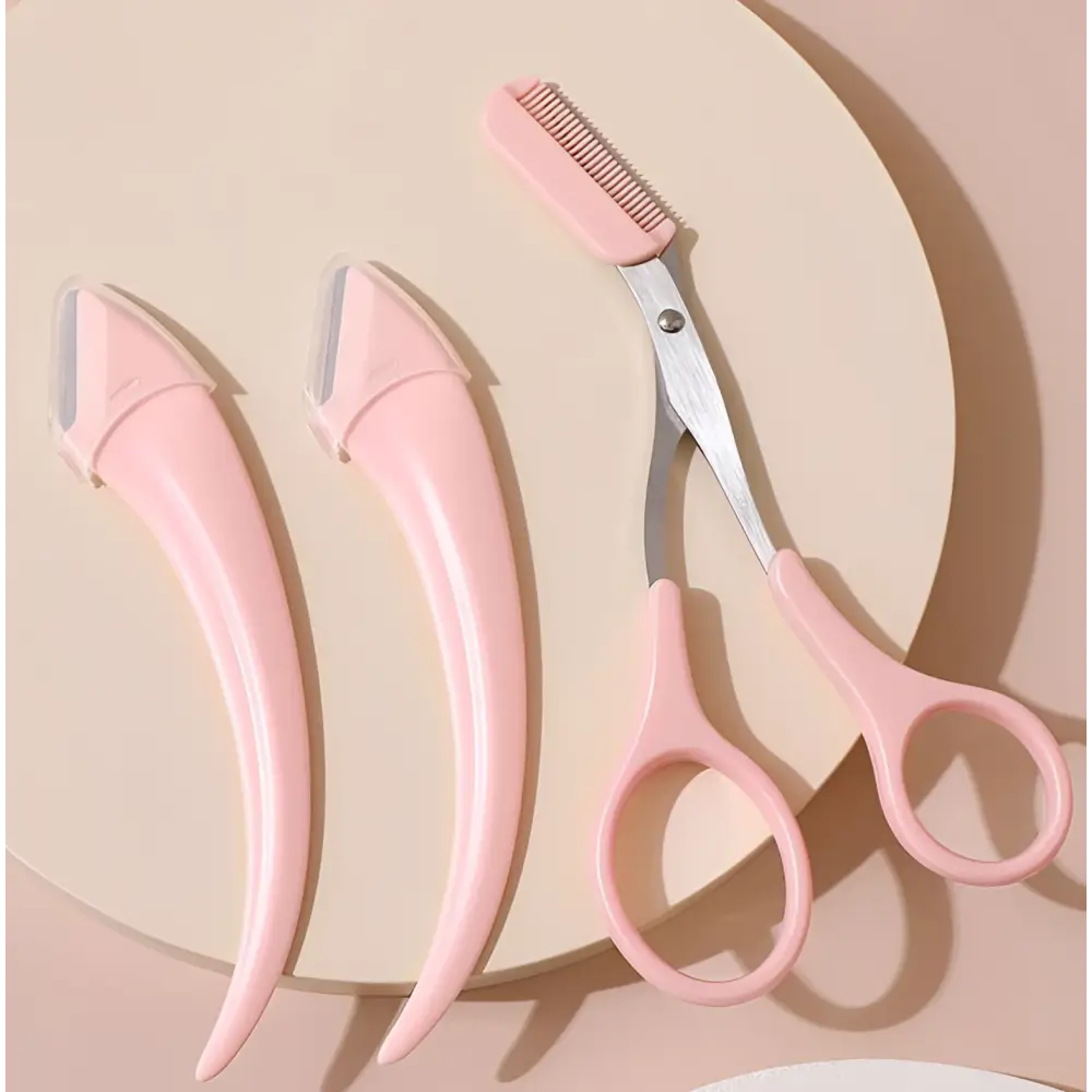 Set of three pink plastic eyebrow trimmer tools with a precise pink-handled comb scissors for pink eyebrow trimming