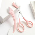 Pink eyebrow trimming knife and scissors set featuring precise eyebrow trimmer with metallic blades and comb attachment