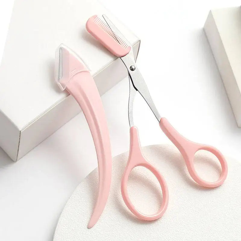 Pink eyebrow trimming knife and scissors set featuring precise eyebrow trimmer with metallic blades and comb attachment