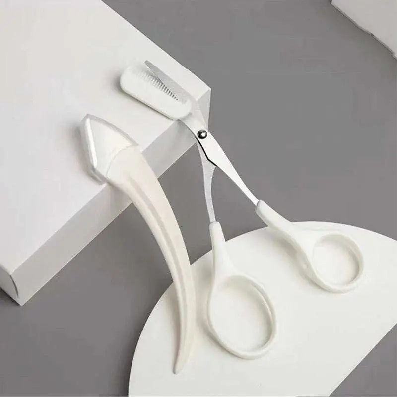 White plastic eyebrow trimmer with curved handle and integrated comb from pink eyebrow trimming knife and scissors set