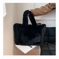 Black faux fur tote bag with soft plush texture and sturdy handles featured in pink faux fur chain plush handbag collection