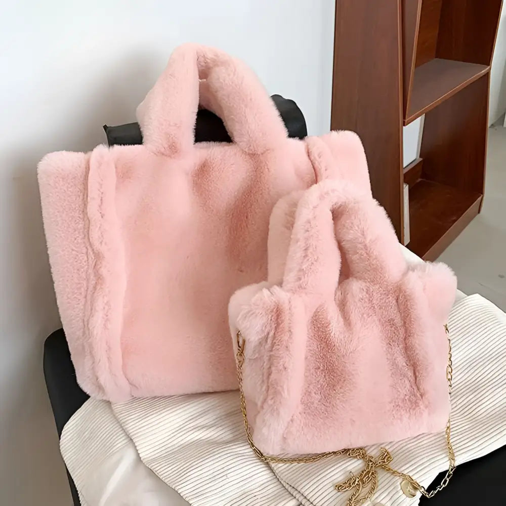 Pink faux fur chain plush handbag featuring soft plush texture and matching chain strap for stylish use