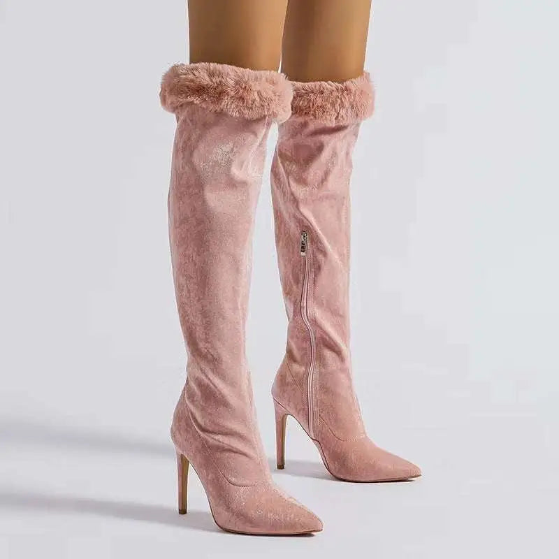 Pink suede over-the-knee boots with pink faux fur trim and pointed stiletto heel featuring a fine heel design