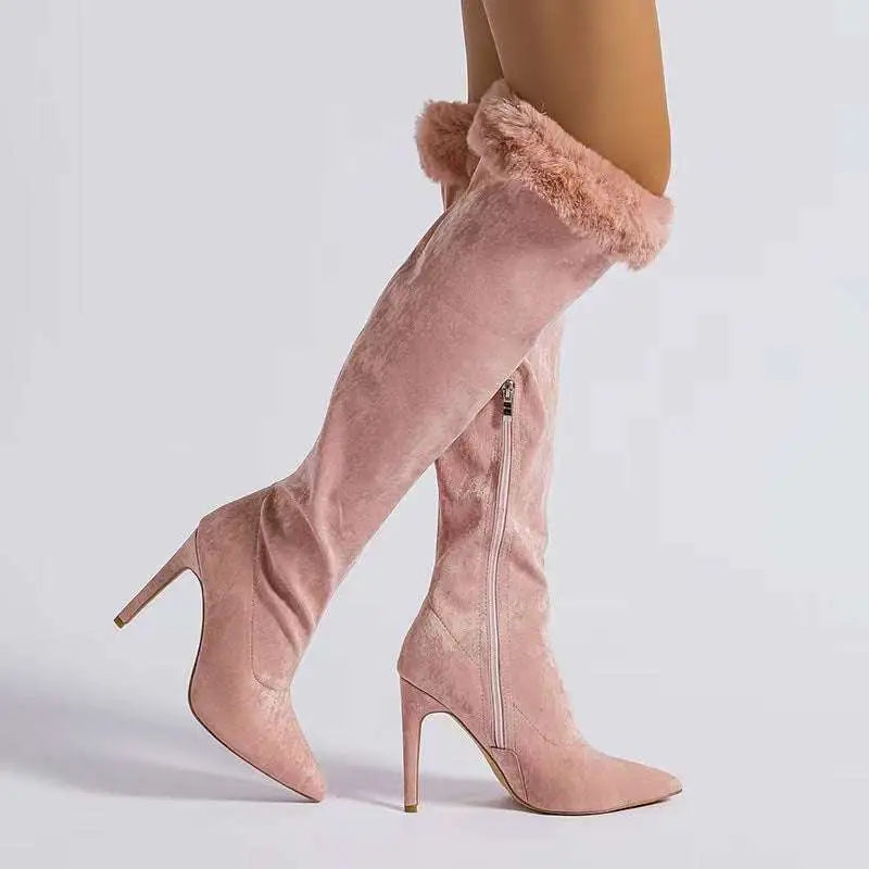 Pink suede over-the-knee boots with pink faux fur cuff and pointed stiletto heel for elegant wear