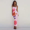 Pink floral american style flower strap dress with vibrant orange and purple blossoms and spaghetti straps