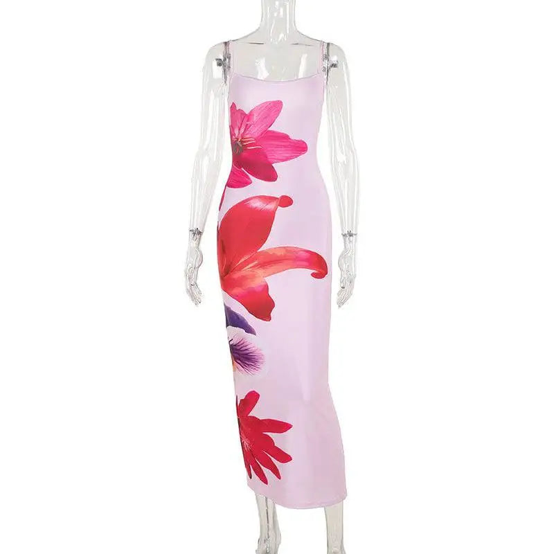 A pink floral american style flower strap dress with spaghetti straps and midi length perfect for summer wear