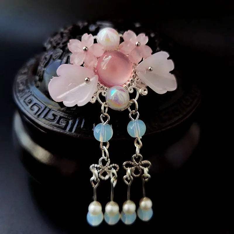 Pink floral retro headgear girls hairpin with silver filigree, translucent gemstones, dangling beads, and pearl accents