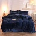 Deep navy plush duvet cover set with fluffy faux fur texture and satin-lined edges in pink fluffy faux style